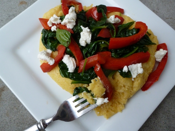 polenta with spinach, red peppers, and goat cheese